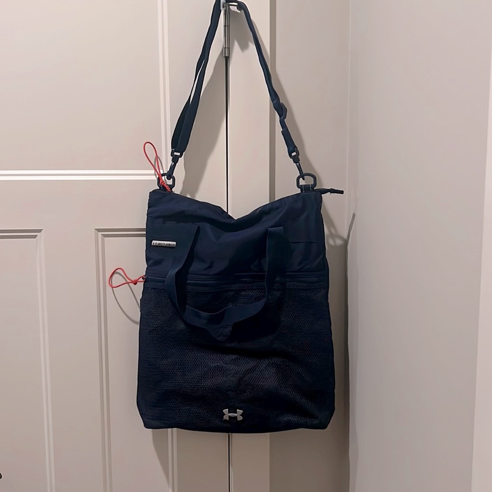 Under Armour Gym Bag. Navy blue with orange accents - perfect condition!